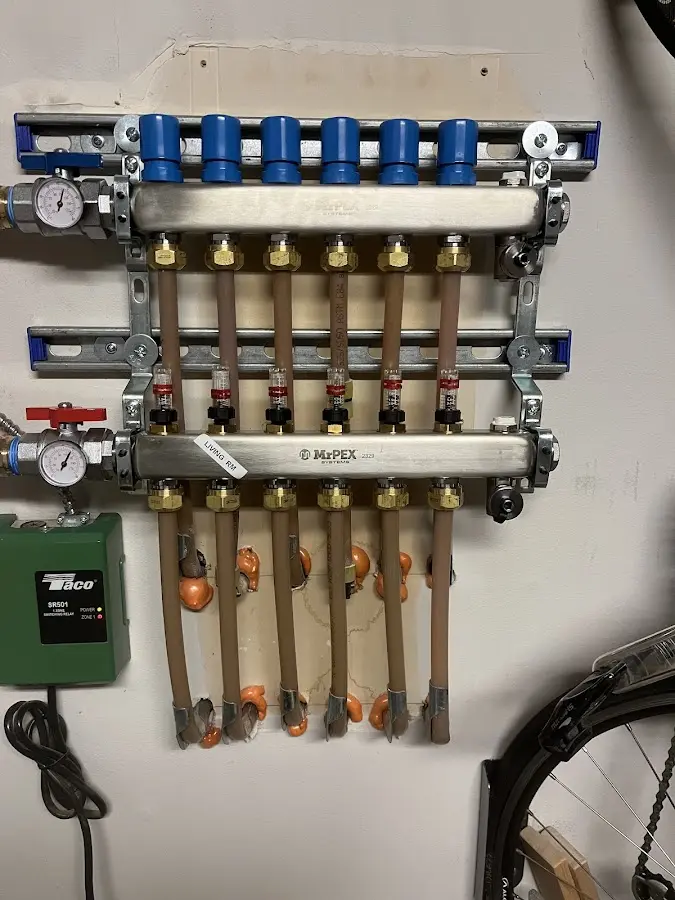 Plumber performing Water Heater Repair at a residential property in New Hanover